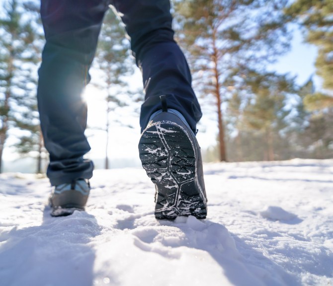 A person walking in snow.
